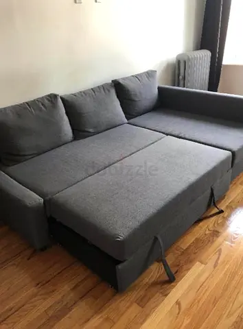 Grey L-Shaped Sofa Bed with Pull Out Mattress