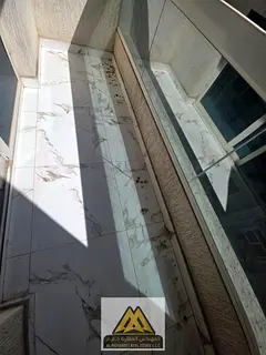 A room and a living room with a balcony in an area near Al-Aqsa School and Delta Center, close to al