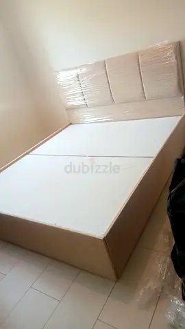Queen size bed frame with upholstered headboard - like new