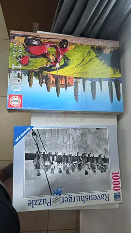 Two Jigsaw Puzzles — 500-piece Vespa Scene and 1000-piece Riverside Puzzle