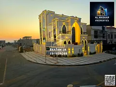 Corner villa for sale in Ajman, 7 bedrooms, majlis, 2 living rooms, and a roof terrace | Freehold ow