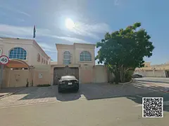 A luxury villa for sale in Al-Rawda 3 area, featuring a stylish modern design and a prime location w