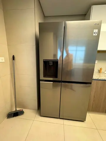LG Stainless Steel French Door Refrigerator with Water Dispenser - Good Condition