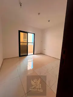 Two-bedroom apartment with living room for annual rent in Al Majaz 2, strictly for bachelors. Featur