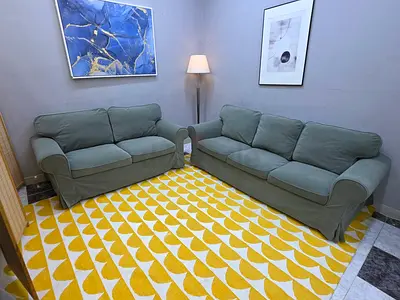 Pair of green fabric sofas - 2-seater and 3-seater, good condition