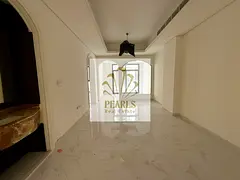 2BR living majlis first tenant central AC wall closets pool jacuzzi free month in Al Tallah 2 Ajman,
