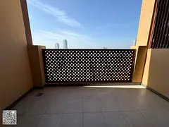 Spacious two-bedroom apartment with a living room, first occupancy, in the Al Nakheel area, next to