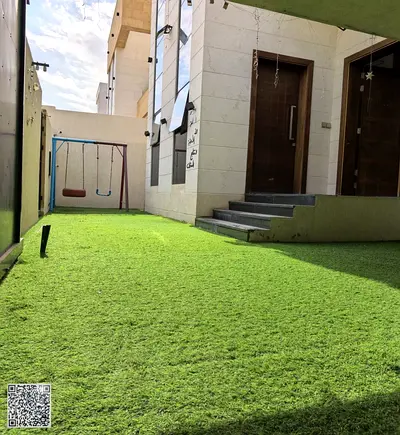 A distinctive villa for annual rent in Al Yasmin, consisting of 5 master bedrooms, a majlis, a living room, and a maid's room.