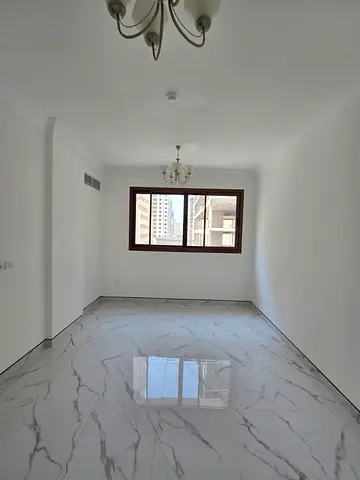 One-bedroom apartment with a living room in Al Qasimia (Al Mahatta area); first-time occupancy. Includes one month of free rent. Security deposit 2000