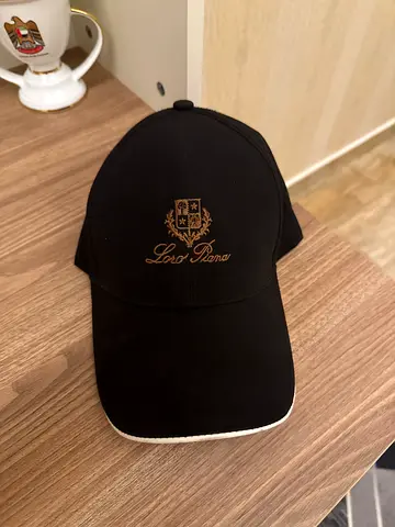 Black Luxury Cap with gold embroidered crest - like new