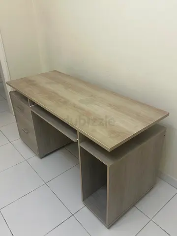 Light wood computer/office desk with storage drawers and shelves