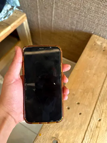 Used iPhone with case - screen has minor scratches