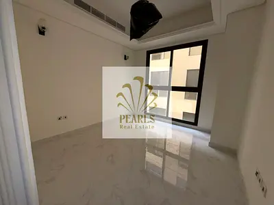 Annual rent, first tenant in Al Tallah 2: 2 bedrooms, hall, majlis, 3 baths, central AC, balcony, b