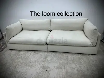 Looks great condition the loom collection three seater sofa