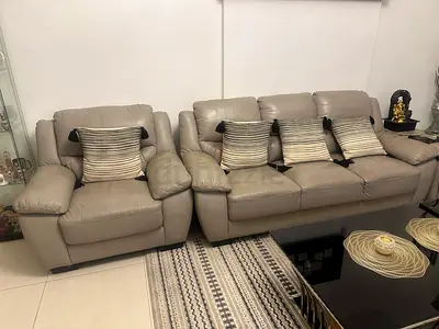Light grey leather seater sofa + armchair set  and centre table in good condition