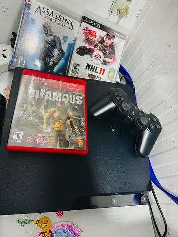 PlayStation 3 Slim with 3 Games (Assassin's Creed, NHL 11, inFAMOUS) and DualShock Controller