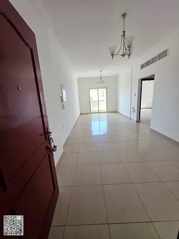 One bedroom and living room for annual rent in Ajman, Al Nuaimiya. 3 months free. 2 bathrooms, balcony. Prime location near Jameel.