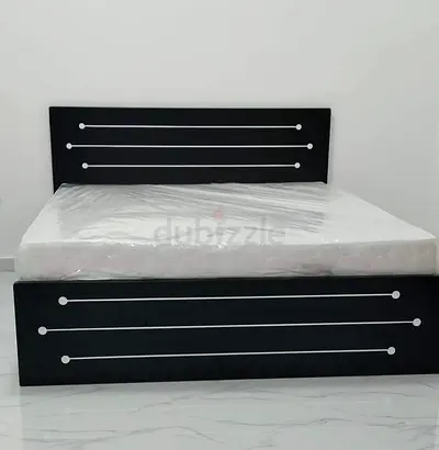 New King size black bed frame with headboard and mattress