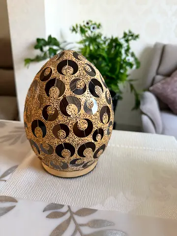 Decorative metal table lamp with pierced crescent design