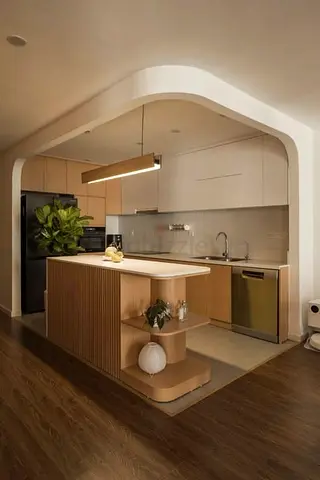 Modern wooden kitchen island with built-in shelving and cabinets