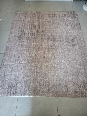 Light beige modern area rug - good condition, medium size