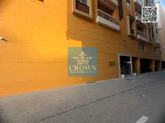 New Brand Residential & Commercial Building {Fully Rented} highly sought-after Academy Street, Al Ta