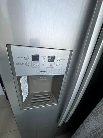 Side-by-side Refrigerator with Water & Ice Dispenser - Good Condition