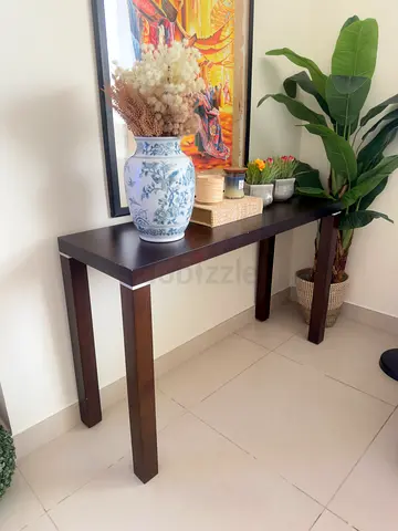 Elegant Dark Wood Console Table – AED 200