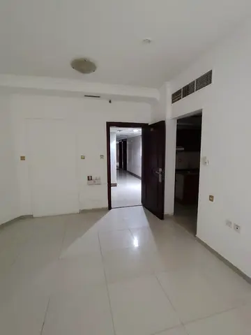 Studio for rent right off the Dubai exit; AED 22,000; located in a full-service complex.