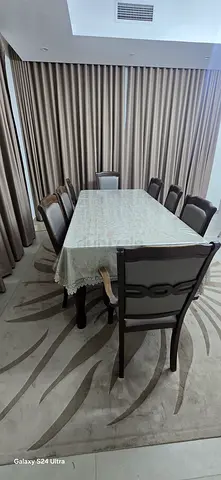 Modern 8 Seater Dining Table with Upholstered Chairs