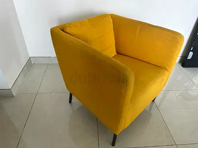 Mustard yellow single armchair with cushion