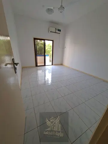 For Rent in Sharjah Al Maysaloon Two Bedrooms and Living Room Second Tenant Split Air Conditioning Balcony Two Bathrooms