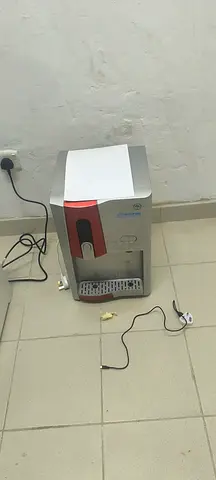 Silver and Red Tabletop Water Cooler