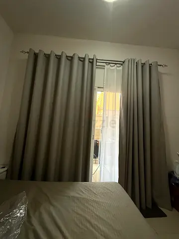 Pair of light-grey blackout curtains with sheer inner panels - living room and bedroom