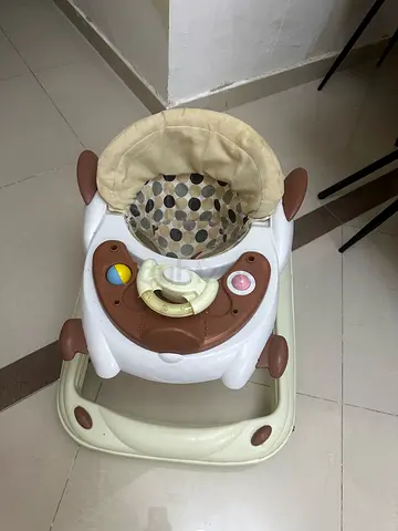 Juniors baby walker with toy tray - good condition