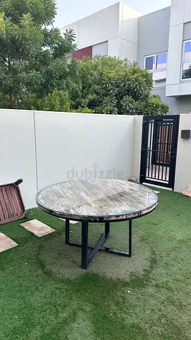 Lucky Furniture. Round Outdoor Dining Table with Stone Top and Metal Base - Good Condition