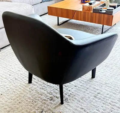 Modern black leather lounge chair - good condition
