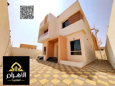 Villa for sale in Ajman, Al Yasmeen area, including electricity, water, and air conditioning. 3 mas