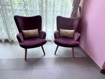 Pair of mid-century modern pink lounge chairs — good condition