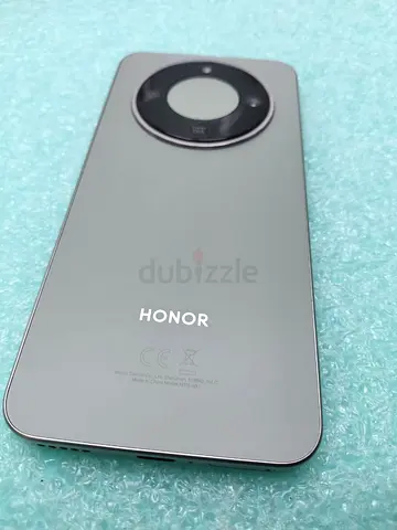 Honor smartphone (good condition) with circular rear camera