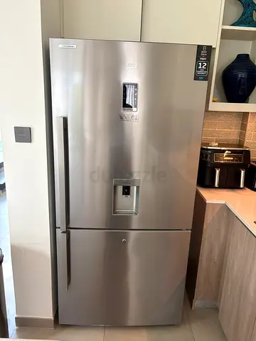 Samsung Stainless Steel Side-by-Side Refrigerator with Water Dispenser