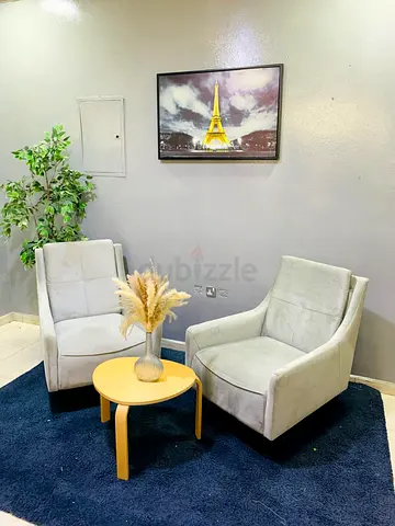 Pair of Light Grey Upholstered Accent Chairs with Small Wooden Side Table