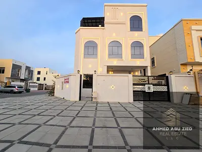 Luxury villa for sale in Al Amerah Ajman | 7 master bedrooms & premium finishes | stone facades & hidden central AC | roof with elegant pergola | mode