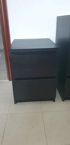Pair of dark wood bedside tables / nightstands - good condition
