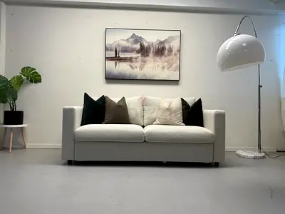 Comfortable modern light grey two seater sofa