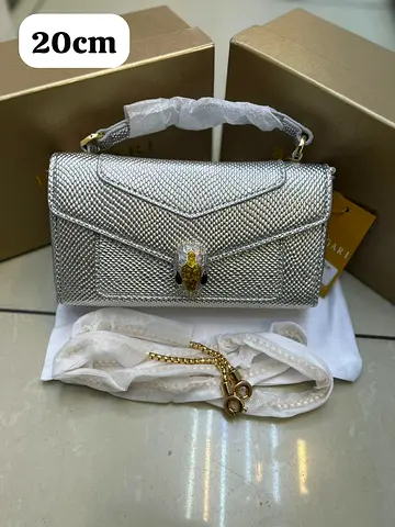 Silver textured 20cm shoulder bag with gold chain - like new
