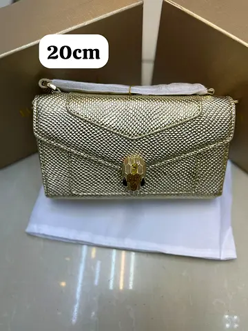 Gold textured mini shoulder bag (20cm) - like new