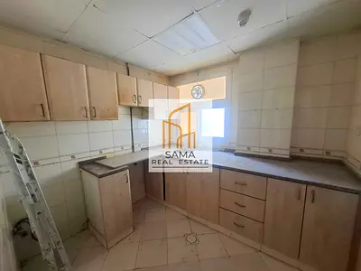 ON ROAD BUILDING 1BEDROOM APARTMENT ONLY 26k CANTRL AC NEAR TO MADINA SHOPPING CENTRE MUWAILAH