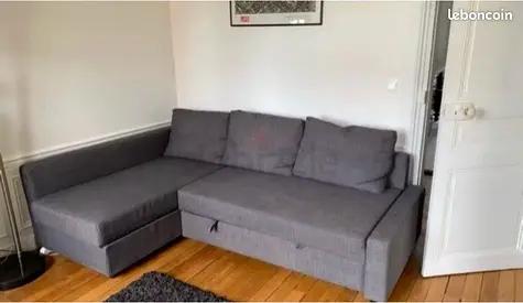 Grey L-shaped sofa bed with storage - good condition