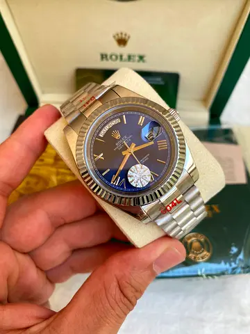 The image displays a Rolex Day-Date 40 (Refcrafted in 18k white gold featuring a fluted bezel, a Pre